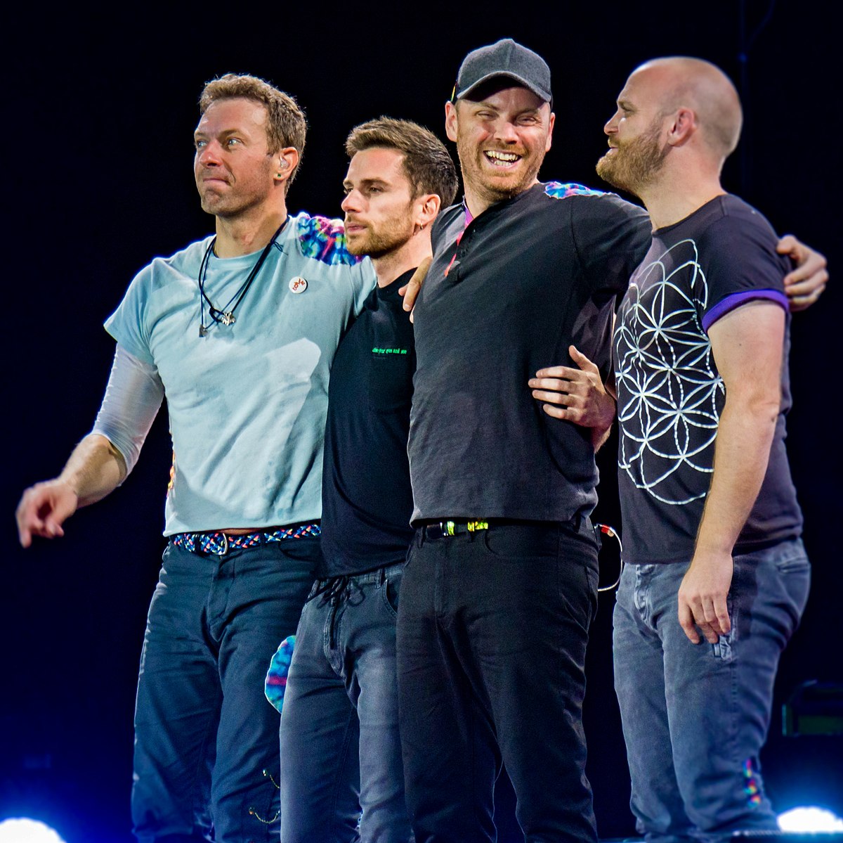 De fire Coldplay-medlemmer live - nogle år før det kedsommelige album, Music of the Spheres. 