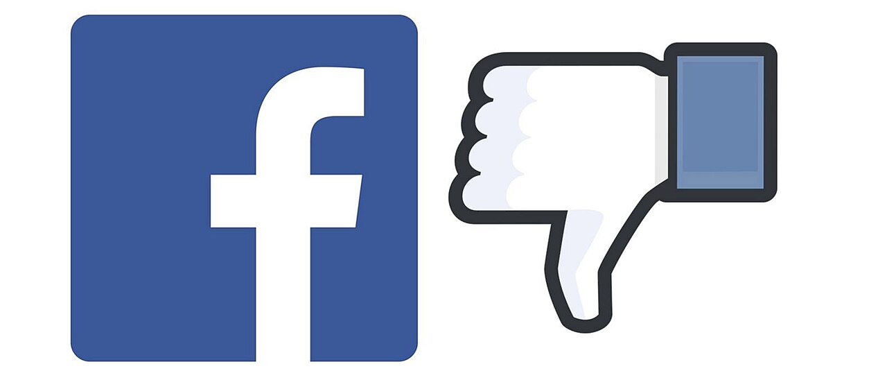 Facebooks logo og en nedadvendt tommelfinger - et dislike