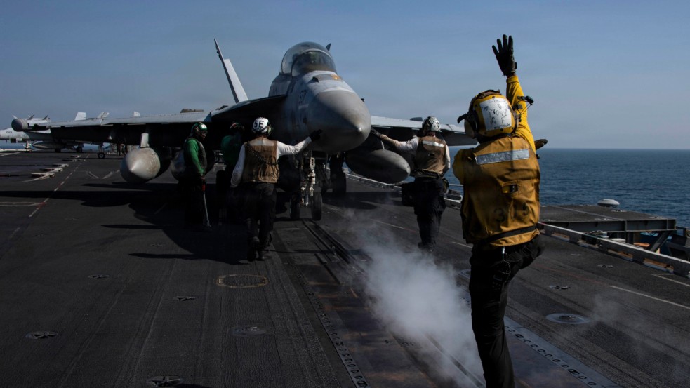 An EA-18G Growler prepares to launch from the flight deck of the aircraft carrier USS Abraham Lincoln in support of Operation Epic Fury in the U.S. Central Command area of responsibility, March 7, 2026.